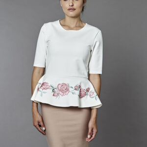 Peplum blouse with exquisite embroidery.