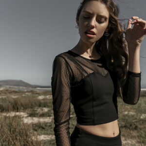 Rayon Spandex black polka dot top.